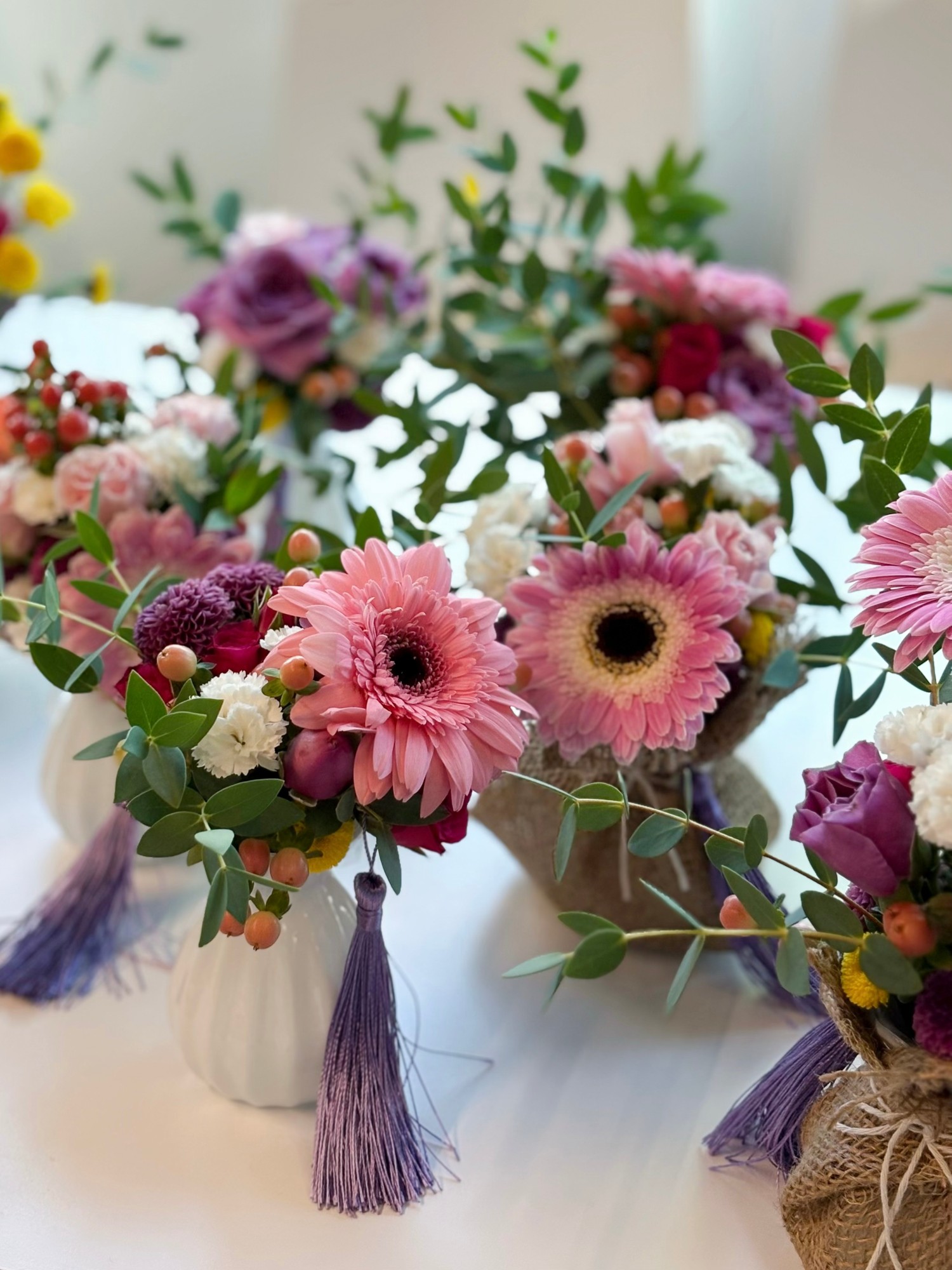 Floral arrangements made in a past Floral Salon class